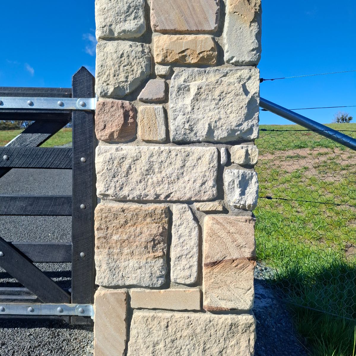 Sandstone, raked mortar joint wall, natural stone masonry by Homestead Stonework, Canberra region
