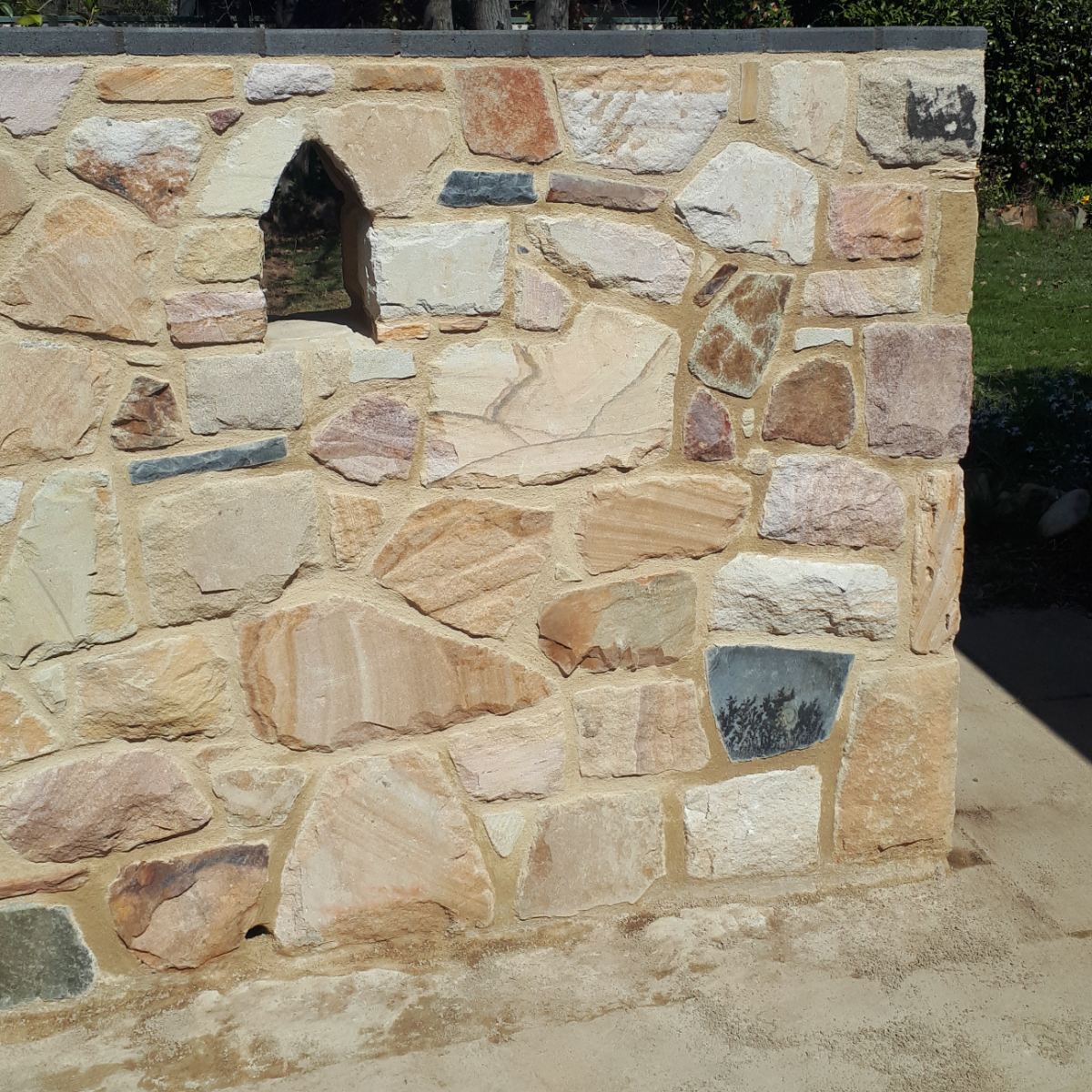 Sandstone, raked mortar joint wall, natural stone masonry by Homestead Stonework, Canberra region
